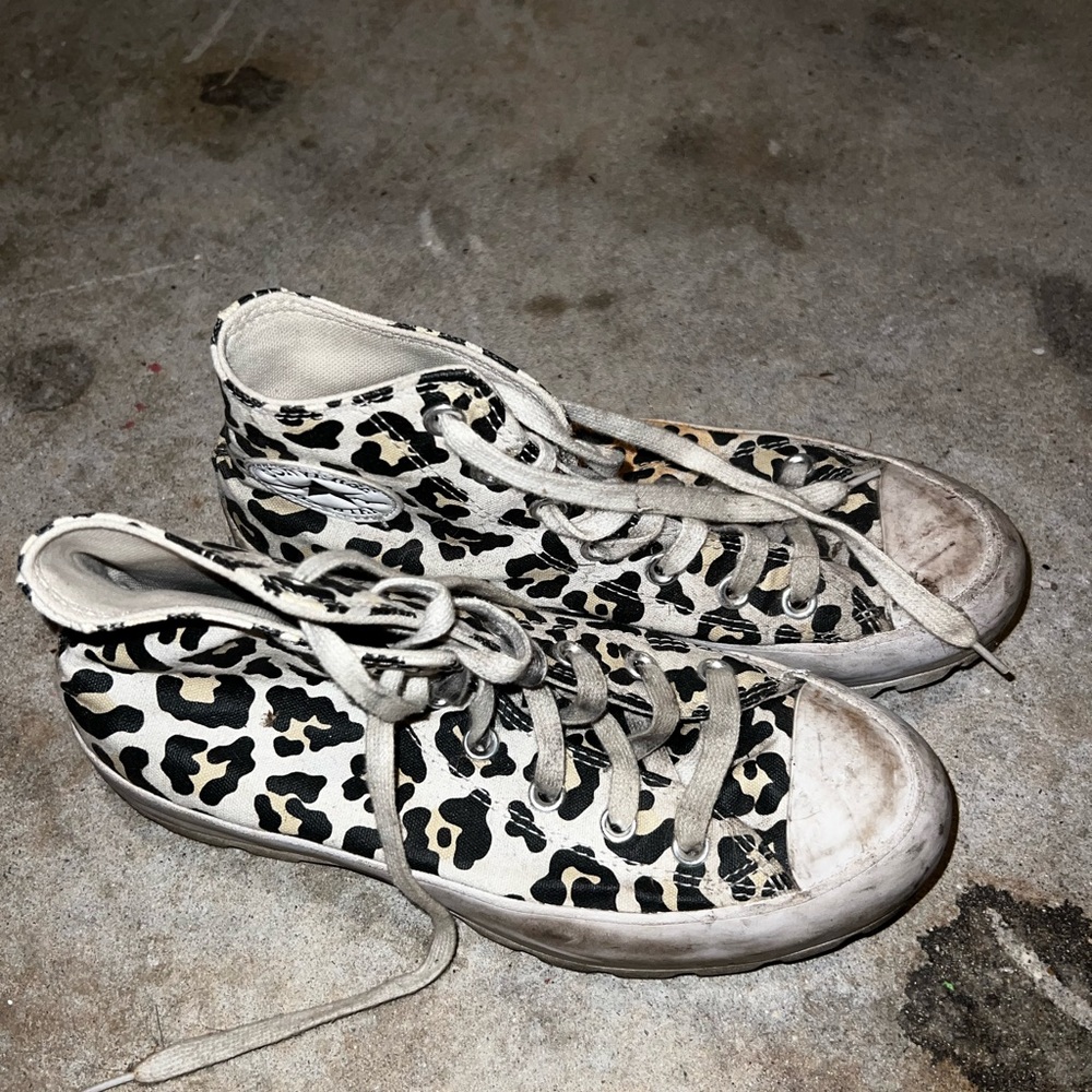 Platform cheetah high top converse